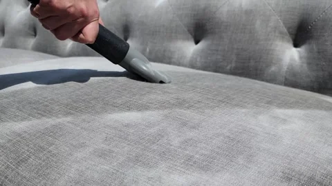 Cleaning couch with Baking Soda and vacuuming  Video stock 240272748