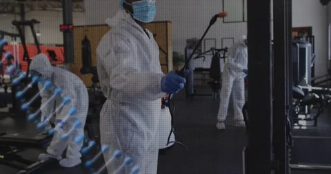 Cleaning crew starting scheduled spraying gym gear with spray wand, blue spiral Stock Footage 327584010