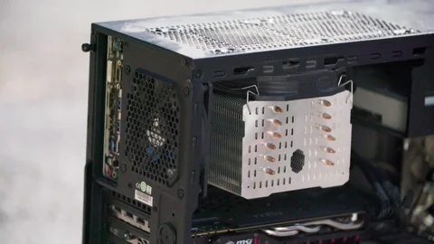 Cleaning desktop personal computer with compressed air Stock Footage 104978612