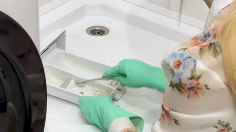Cleaning the detergent compartment of the washing machine.Bathroom Cleaning  Stock Footage 308807349