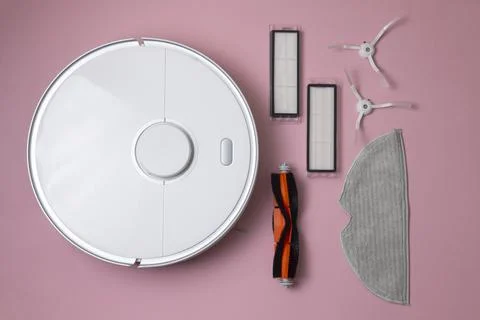 Cleaning Device Components On Background. Spare Parts For Robotic Vacuum Stock Photos