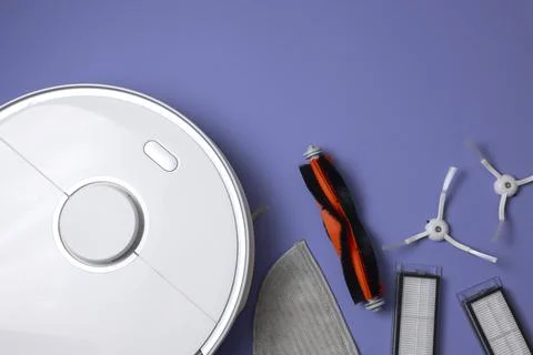 Cleaning Device Components On Background. Spare Parts For Robotic Vacuum Stock Photos