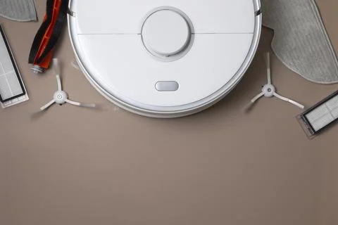 Cleaning Device Components On Background. Spare Parts For Robotic Vacuum Stock Photos