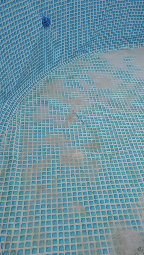 Cleaning Dirty Above Ground Frame Swimming Pool with Soap Foam and Brush Stock Footage 340524264