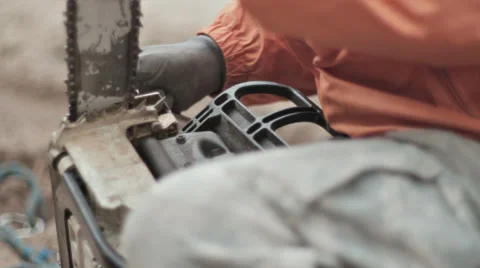 CLEANING DIRTY CHAINSAW Stock Footage 68755591