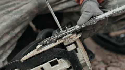 CLEANING DIRTY CHAINSAW Stock Footage 68755821