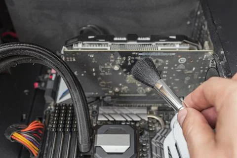 Cleaning dirty computer. Computer maintenance. Cleaning a dirty computer from Stock Photos