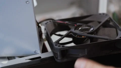 Cleaning dirty desktop computer power supply fan from dust Vídeos de archivo 162533853
