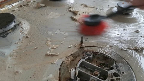 Cleaning dirty working surface of the gas stove Stock Footage 100759943