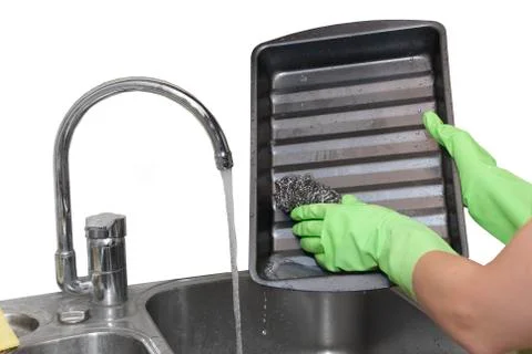 Cleaning dripping pan Stock Photos