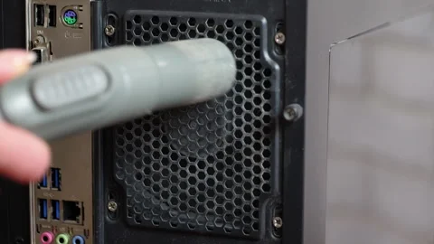 Cleaning dust from computer power supply fan Stock Footage 334775708