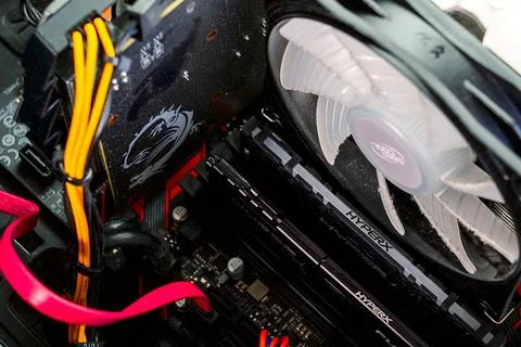Cleaning the dust of the system unit of a home personal computer Stock Photos
