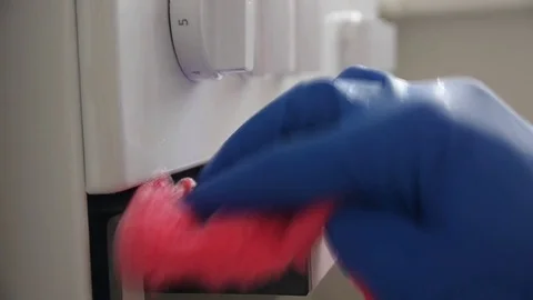 Cleaning The Electric Stove Stock Footage 81453374