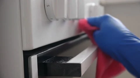 Cleaning The Electric Stove In The Kitchen Stock Footage 133537831