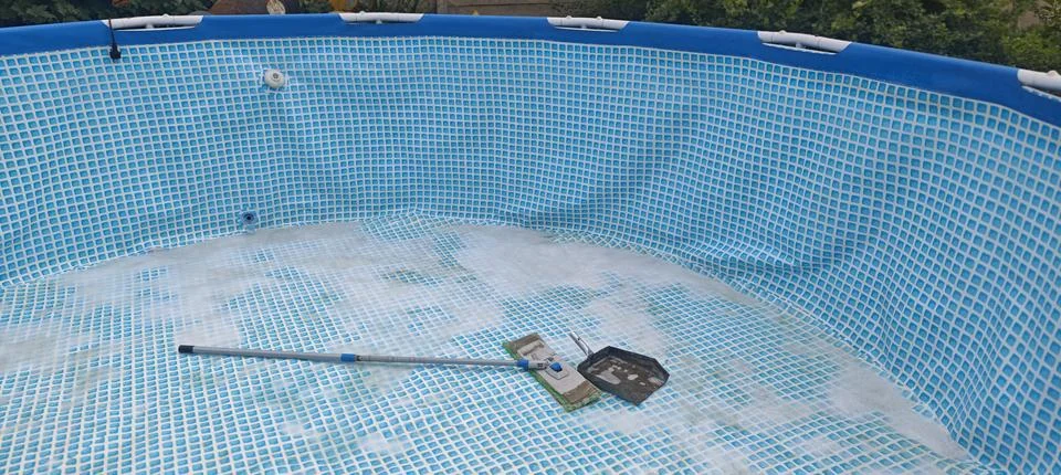 Cleaning Empty Above Ground Frame Swimming Pool with Mop, Brush and Soap Foam Stock Photos