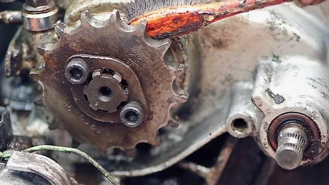 Cleaning the engine by toothbrush closeup Stock Footage 70814669