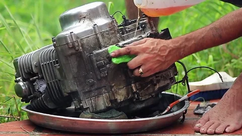 Cleaning the engine by toothbrush Stock Footage 70802670