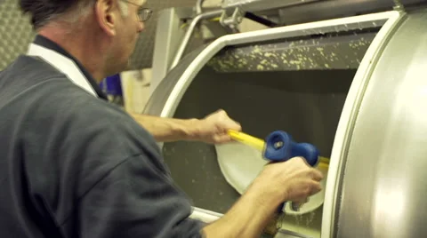 Cleaning a filter filled with butter Stock Footage 35179271