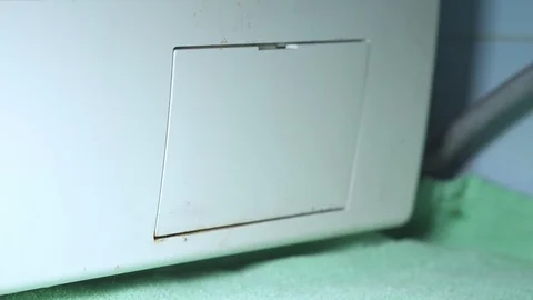 Cleaning the Filter of an old and dirty Washing Machine, Close up Stock Footage 107152010
