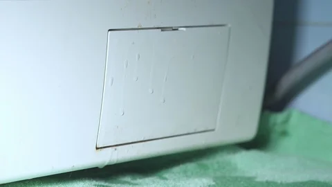 Cleaning the Filter of an old and dirty Washing Machine, Close up Stock Footage 107152078