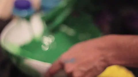 Cleaning fingers with ink Stock Footage 30482409