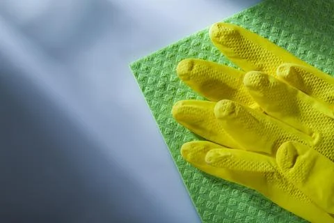 Cleaning flannels Protective gloves on a white background Stock Photos