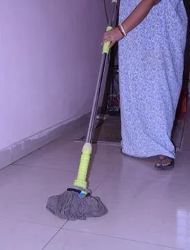 Cleaning the floor with a mop 스톡 사진