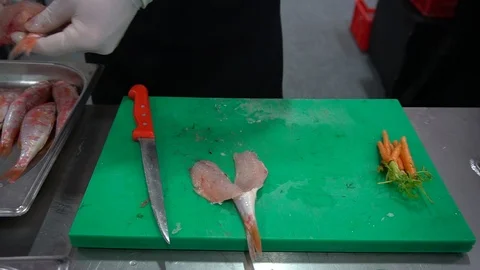 Cleaning Fresh Raw Sea Fish. Stock Footage 105877205
