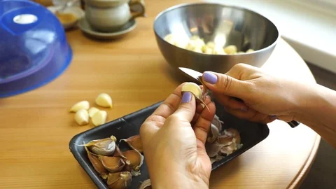Cleaning garlic Stock Footage 106066620