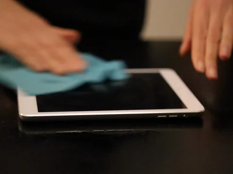 Cleaning glass surface tablet pc Stock Footage 73363418