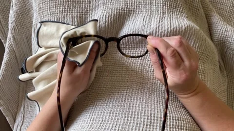 Cleaning glasses very carefully Stock Footage 342335586