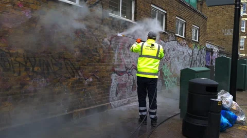 Cleaning graffiti. Stock Footage 178374104