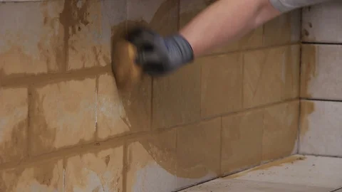 Cleaning grout with sponge Stock Footage 111866022