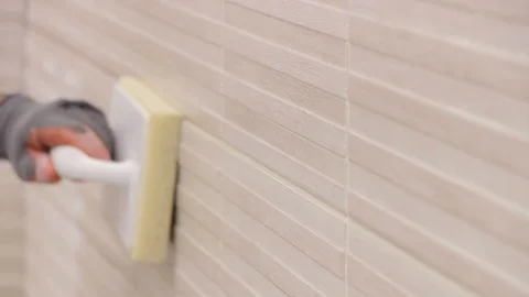 Cleaning grout from tiles Stock Footage 111865419