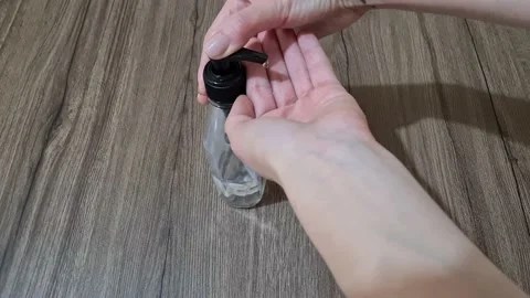 Cleaning Hands With Alcohol-Based Sanitizer Antiseptic Gel. Covid-19 Protection Stock Footage 152094490