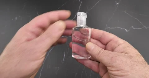 Cleaning Hands With Hand Sanitizer Stock Footage 133449462