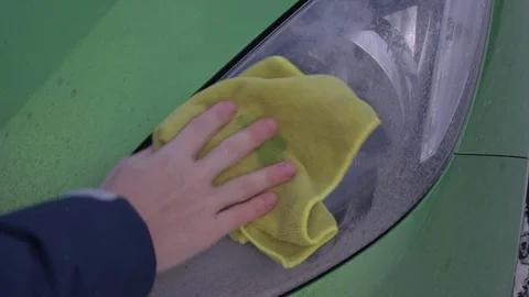 Cleaning headlights Stock Footage 73756334