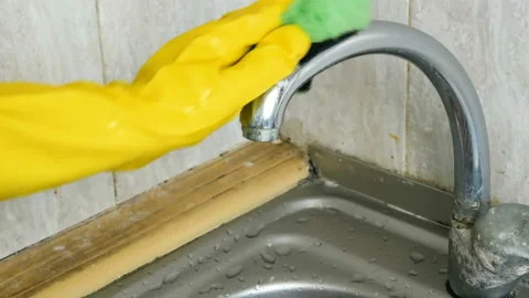 Cleaning home table, sanitizing kitchen table surface with disinfectant spray Stock Footage 160054204