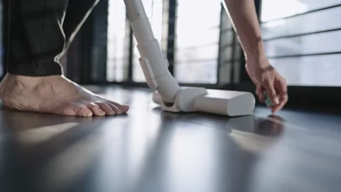 Cleaning house floor by using wireless vacuum cleaner sweeping on dusty surface Stock Footage 150819220
