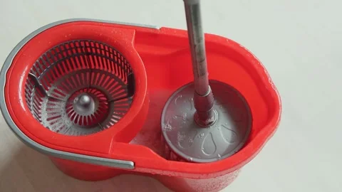 Cleaning the house. Mopping the floor with a mop. Stock Footage 152455338