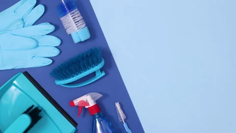 Cleaning household tools appear on dark and bright blue background. Stop motion Видео 151449700