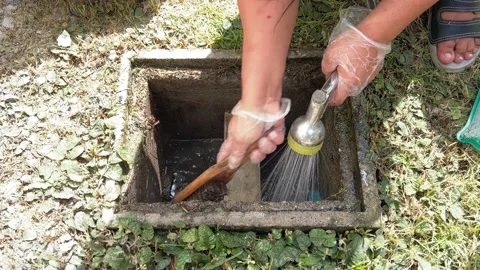 Cleaning inside the grease trap. Stock Footage 225697656