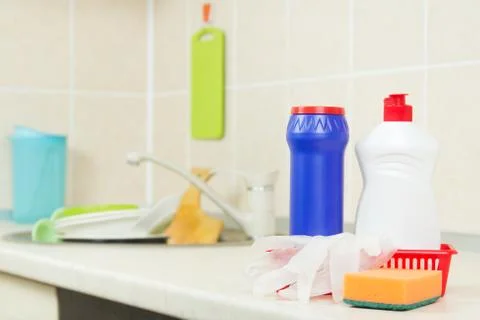 Cleaning items on a kitchen table Stock Photos