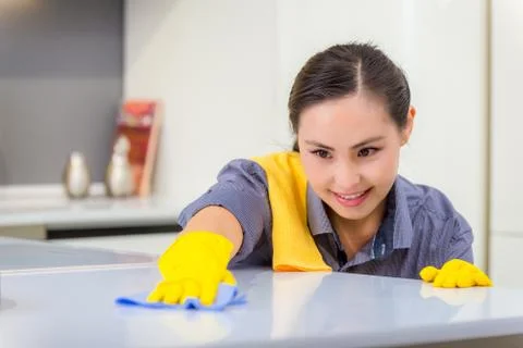 Cleaning in the kitchen Stock Photos