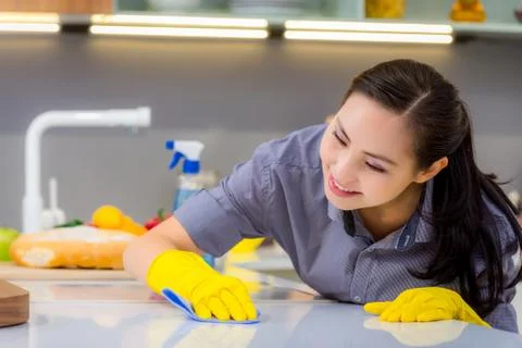 Cleaning in the kitchen Stock Photos