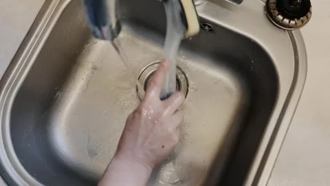 Cleaning Kitchen Sink Under Running Water 스톡 동영상 314409705