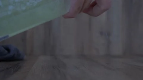 Cleaning the kitchen with spray bottle 4k Stock Footage 150810265