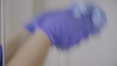 Cleaning lady cleaning a mirror Stock Footage 91030893