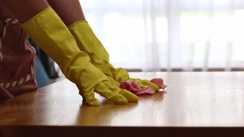 Cleaning lady wipes kitchen table Stock Footage 317260994