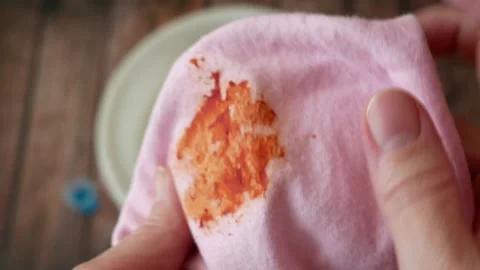 Cleaning laundry manually. Women's hands in gloves washing dirty stained on.. Stock Footage 261279845